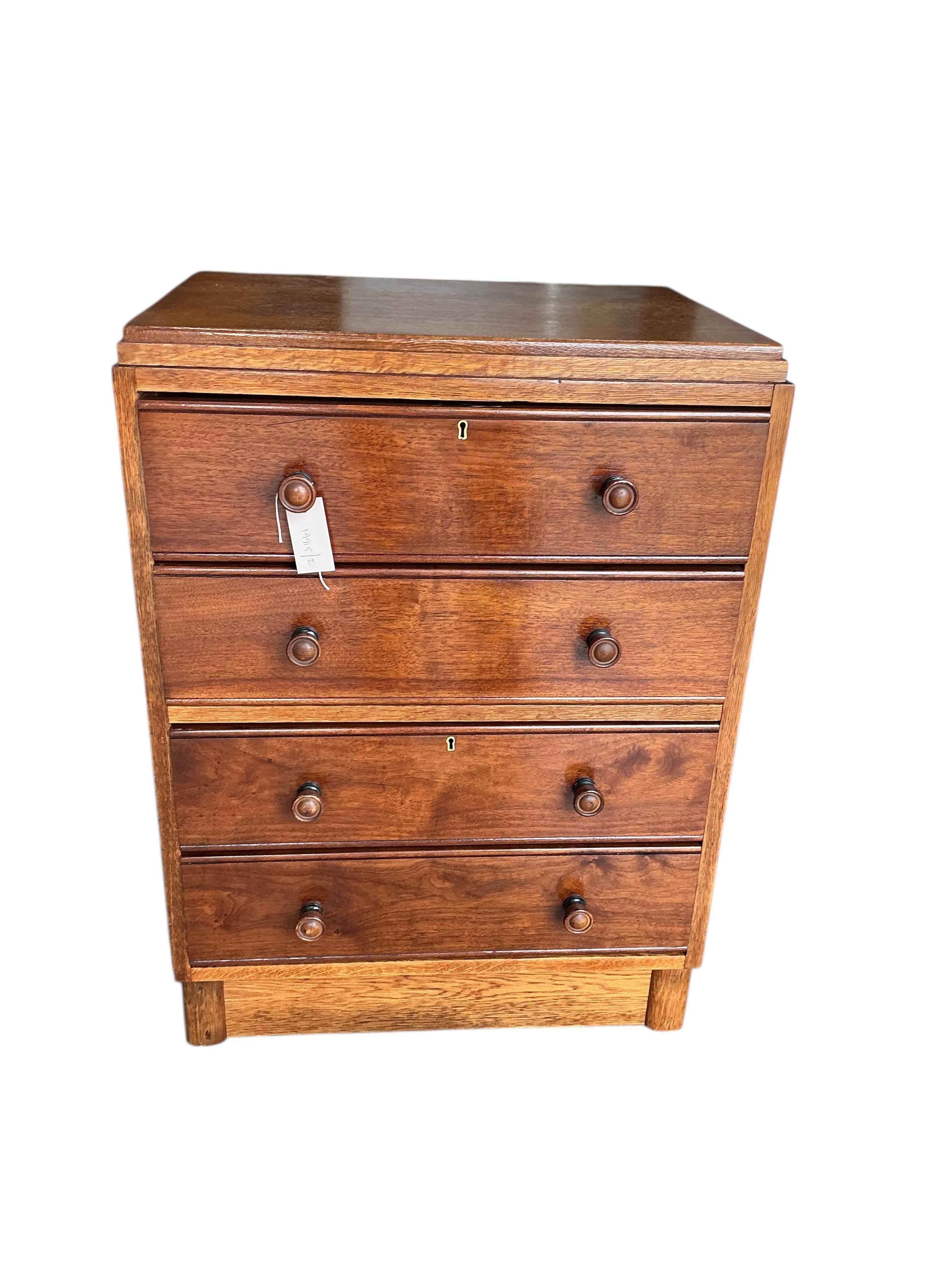 A small early 20th century oak chest of four drawers, width 61cm, depth 44cm, height 83cm